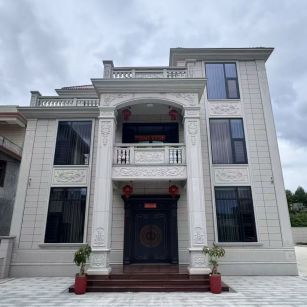 昌都 芝麻白石材别墅干挂案例展示